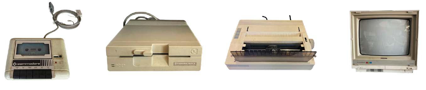 Datasette, Disketten-Laufwerk, Drucker und Monitor des Commodore 64.